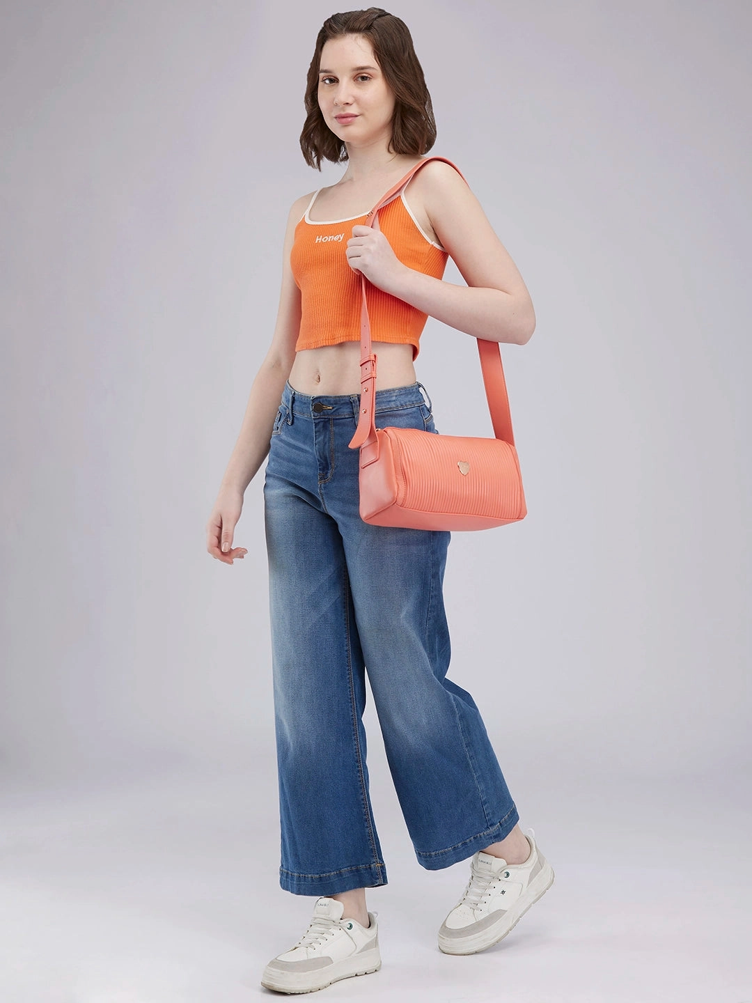 Caprese Ava Medium Coral Sling Bag
