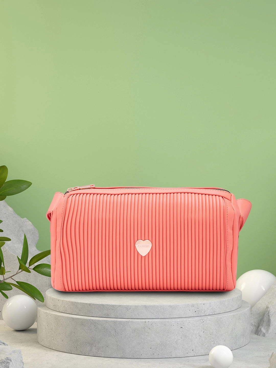 Caprese Ava Medium Coral Sling Bag