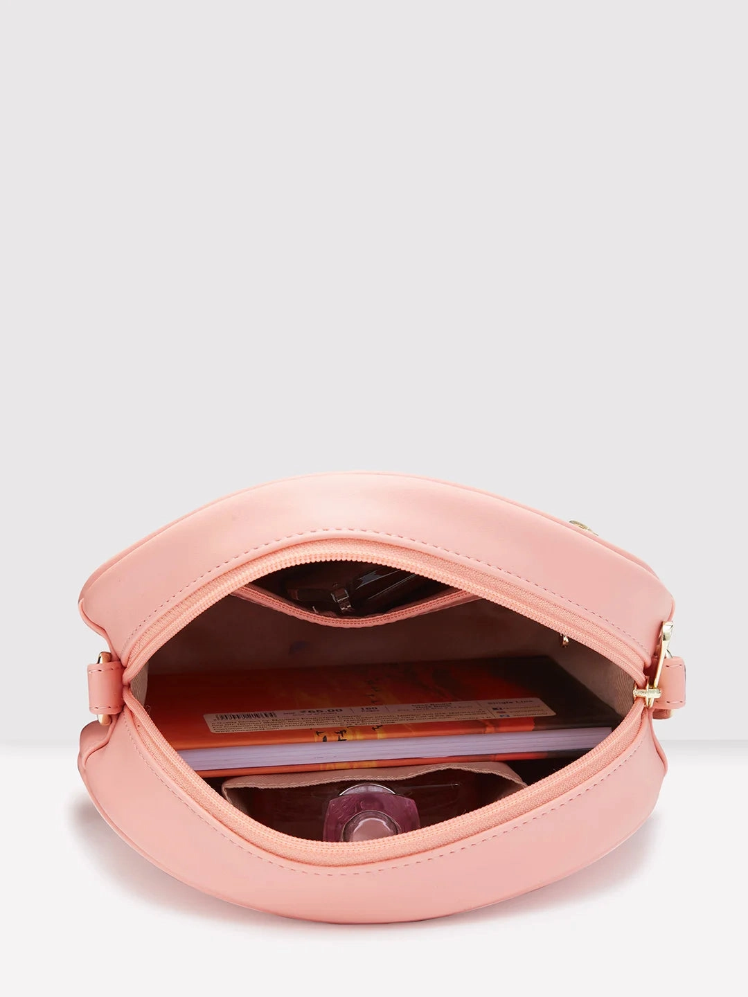 Caprese Dara Medium Pink Sling Bag