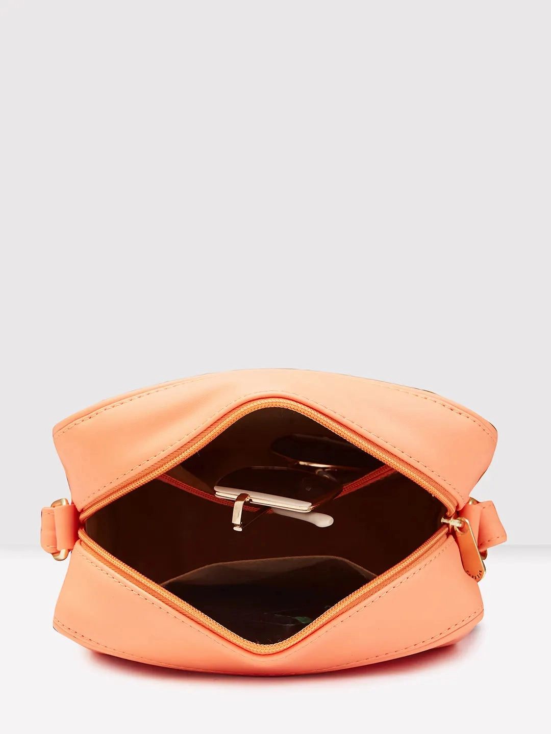 Caprese Dora Medium Coral Sling Bag