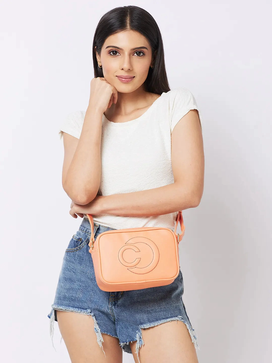 Caprese Dora Medium Coral Sling Bag