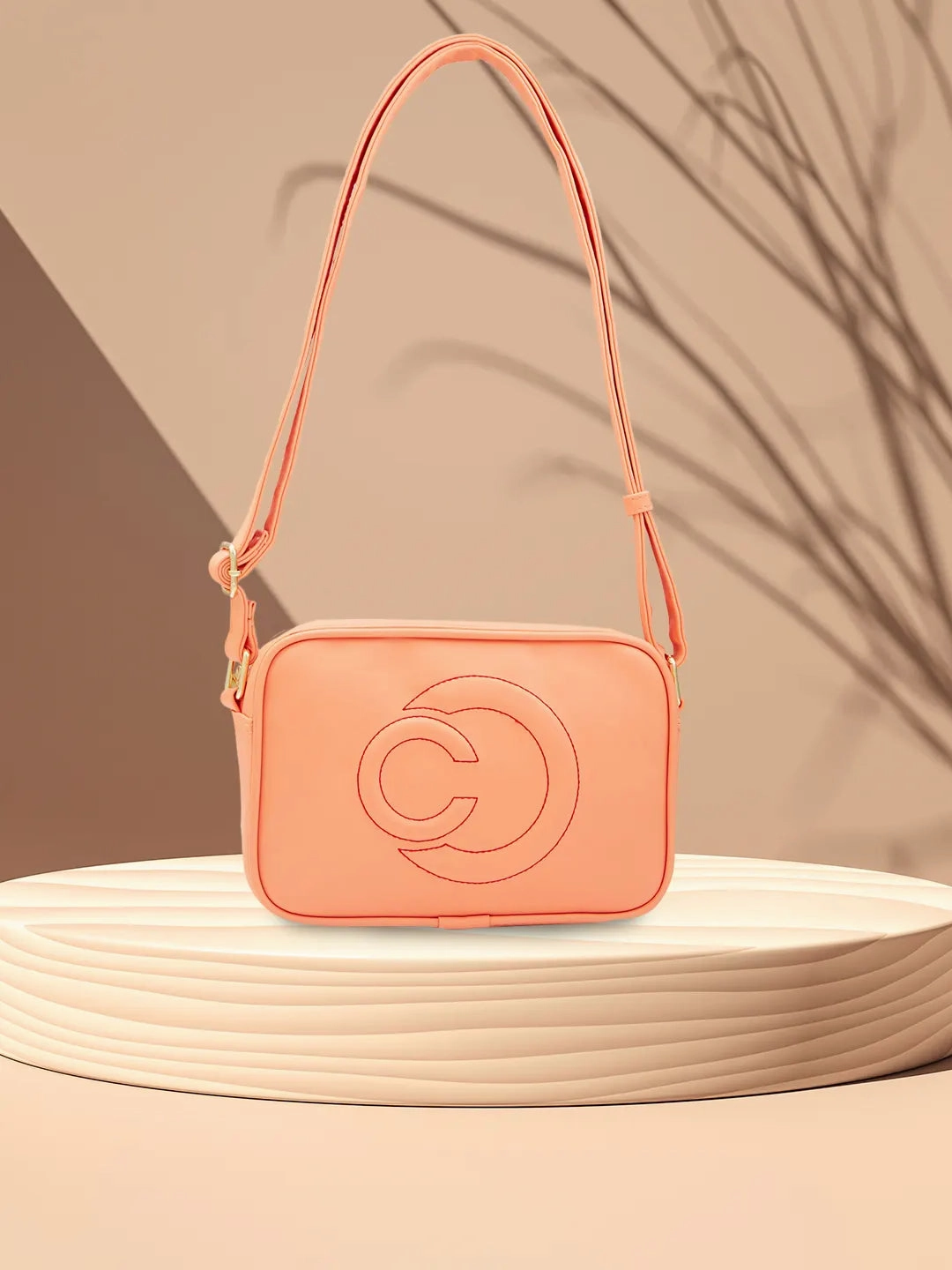 Caprese Dora Medium Coral Sling Bag