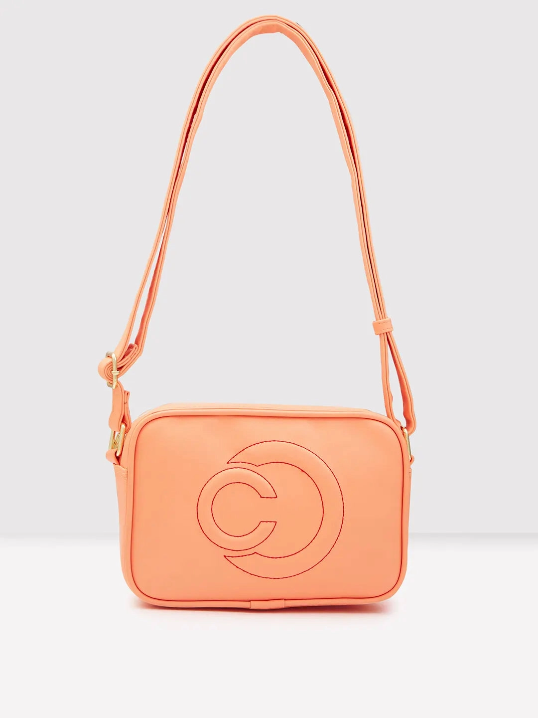 Caprese Dora Medium Coral Sling Bag
