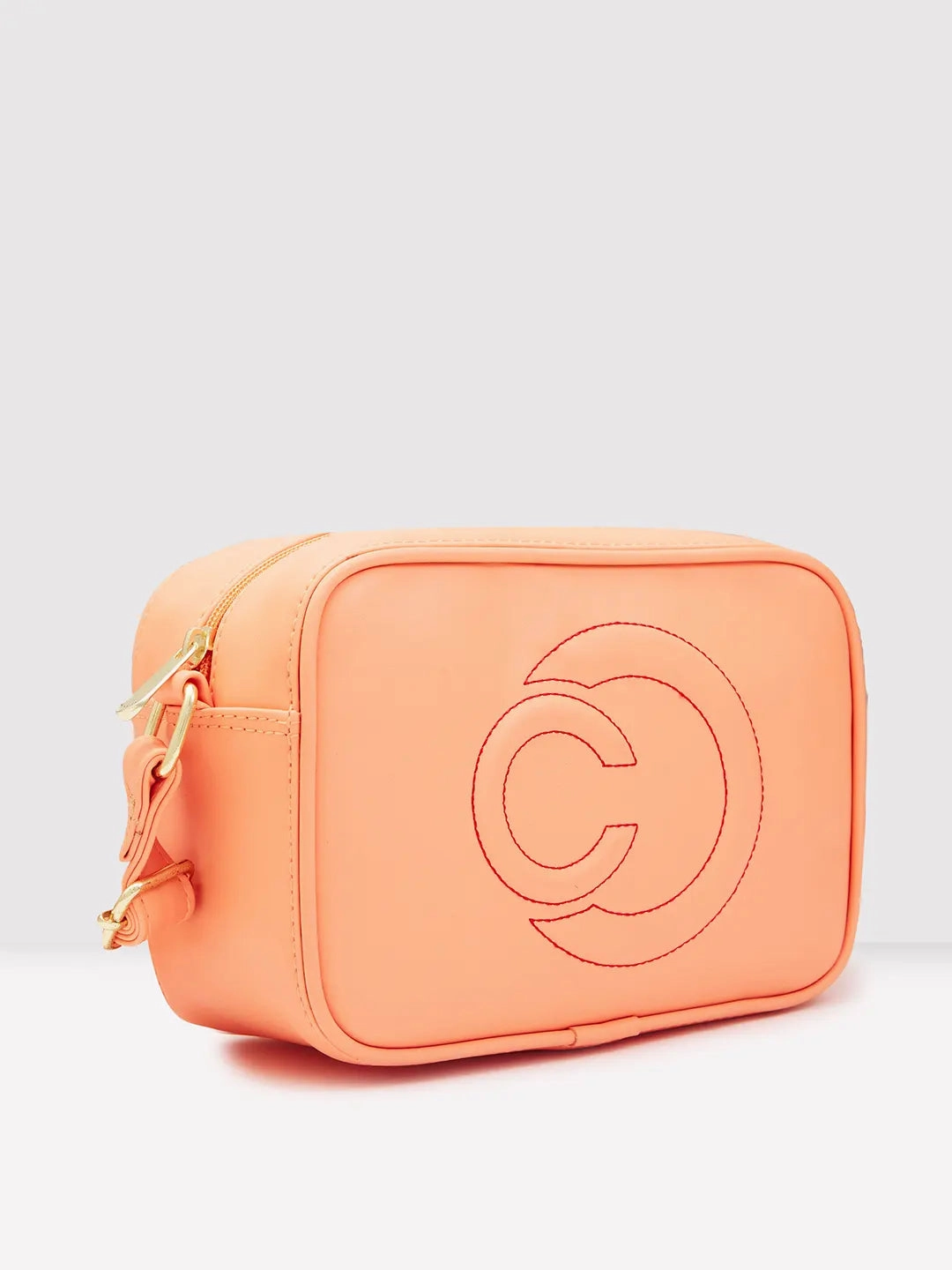 Caprese Dora Medium Coral Sling Bag