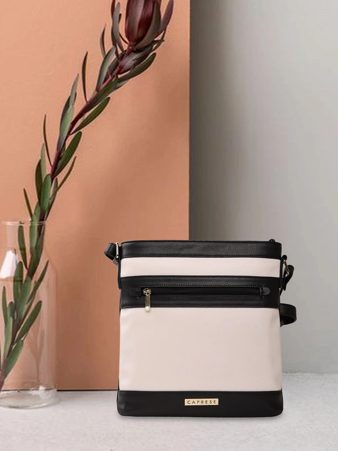 Caprese Marciano Medium Striped Black Sling Bag