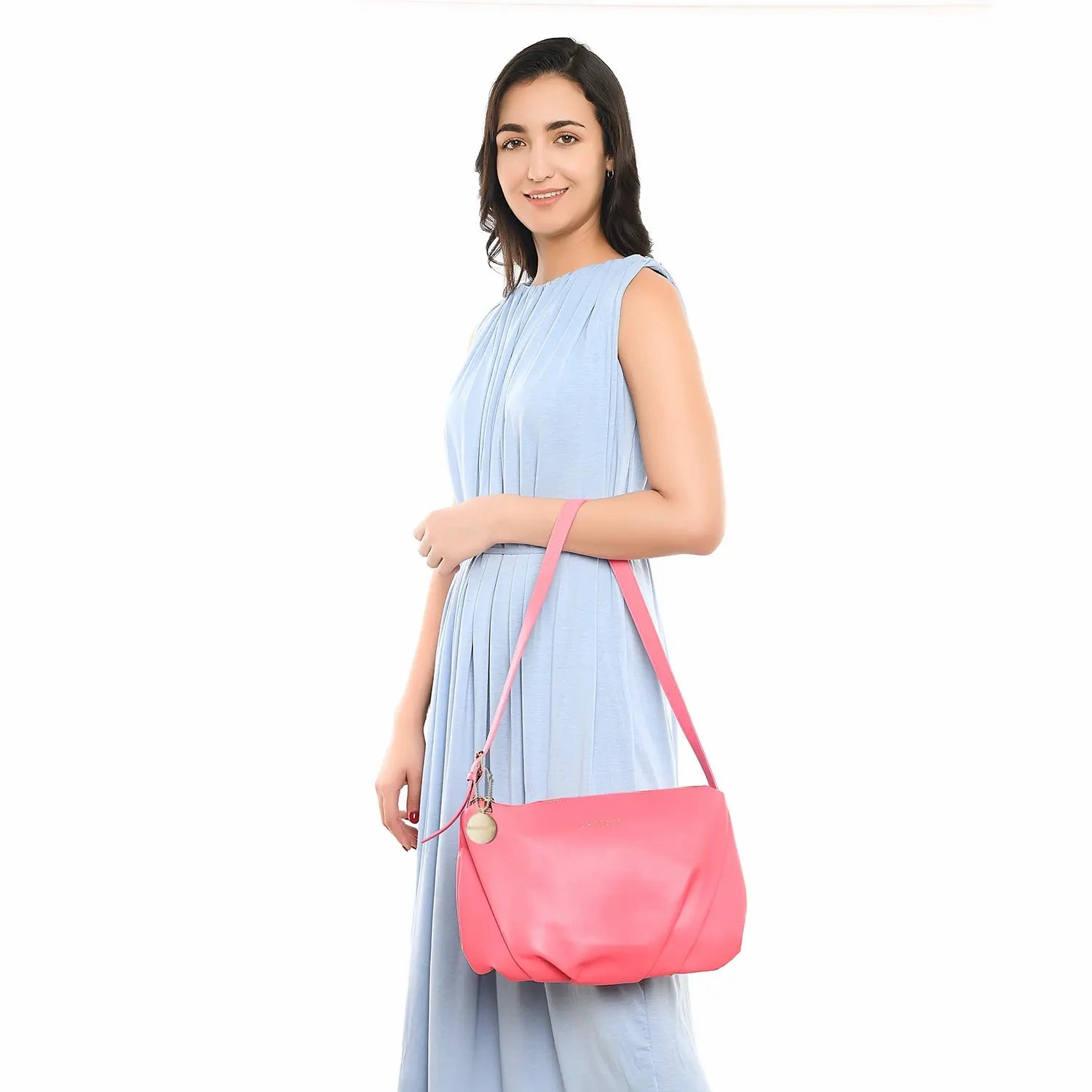 Caprese Novo Medium Peach Sling Bag