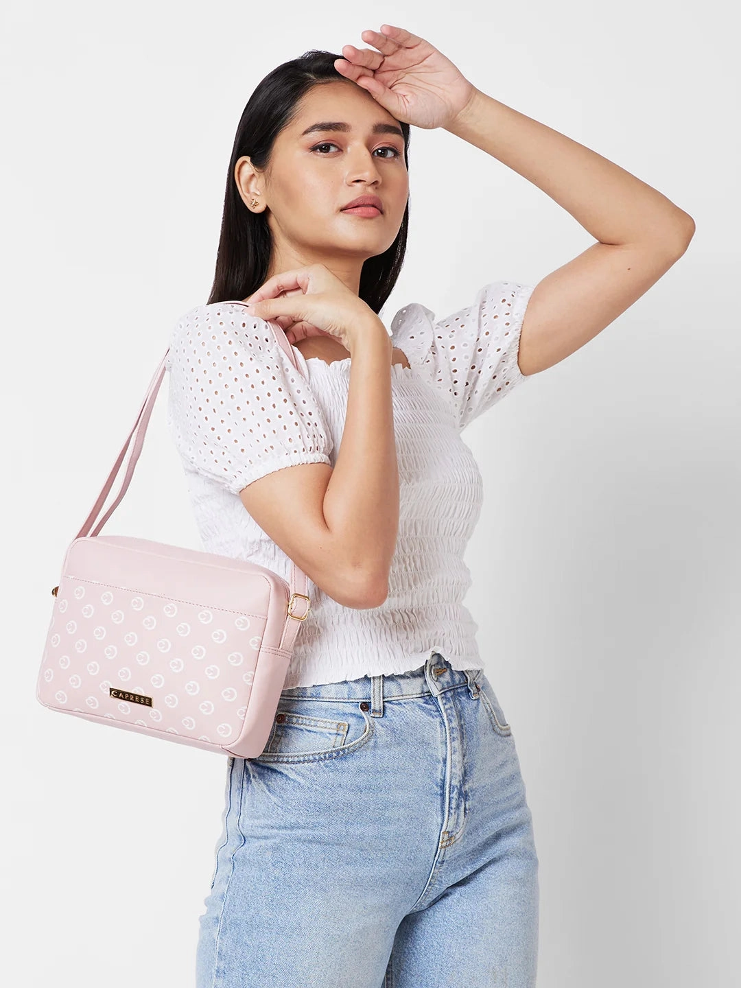 Caprese Siesta Small Powder Pink Sling Bag