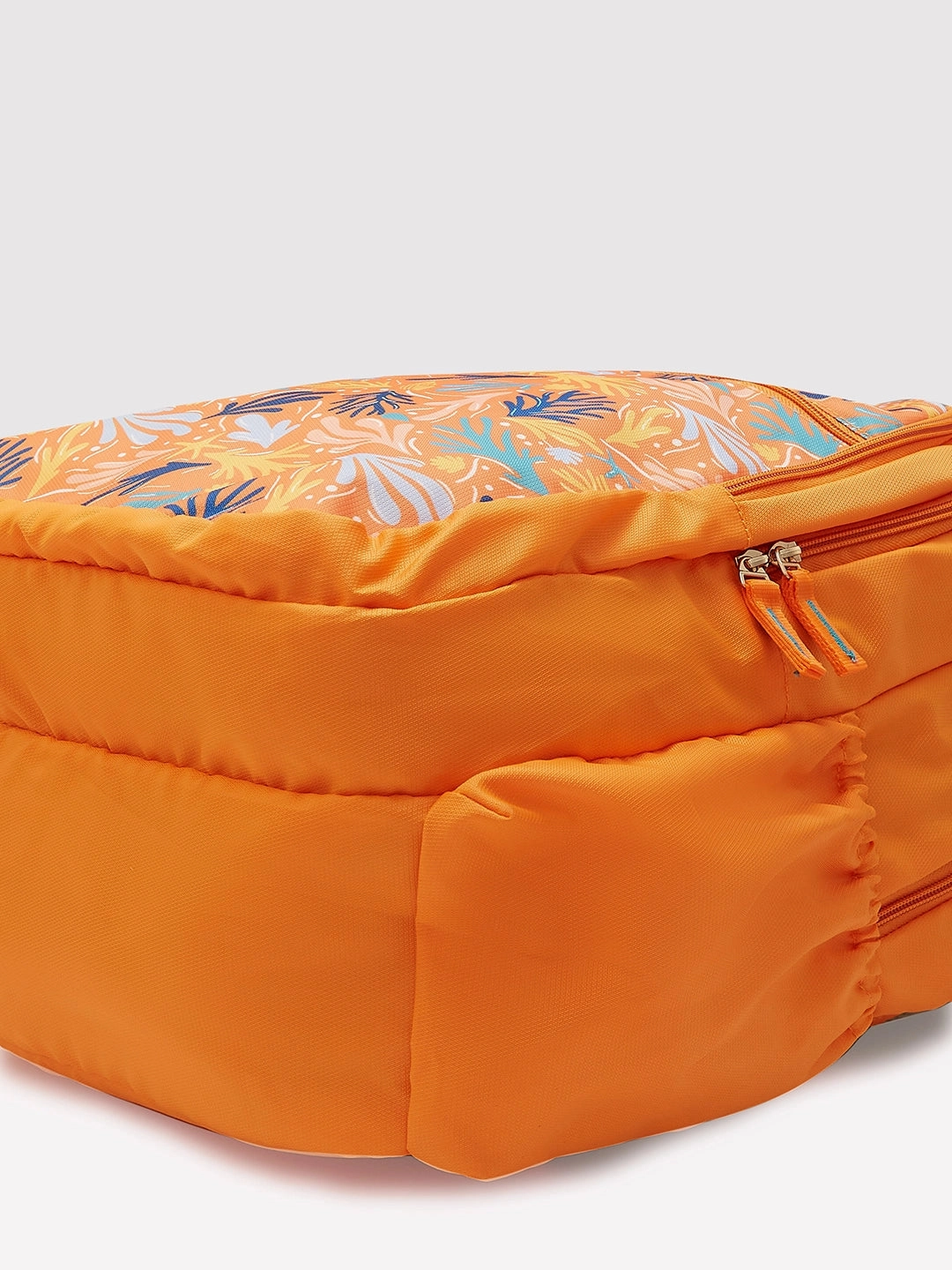Caprese Xenia Large Printed Orange Laptop Backpack
