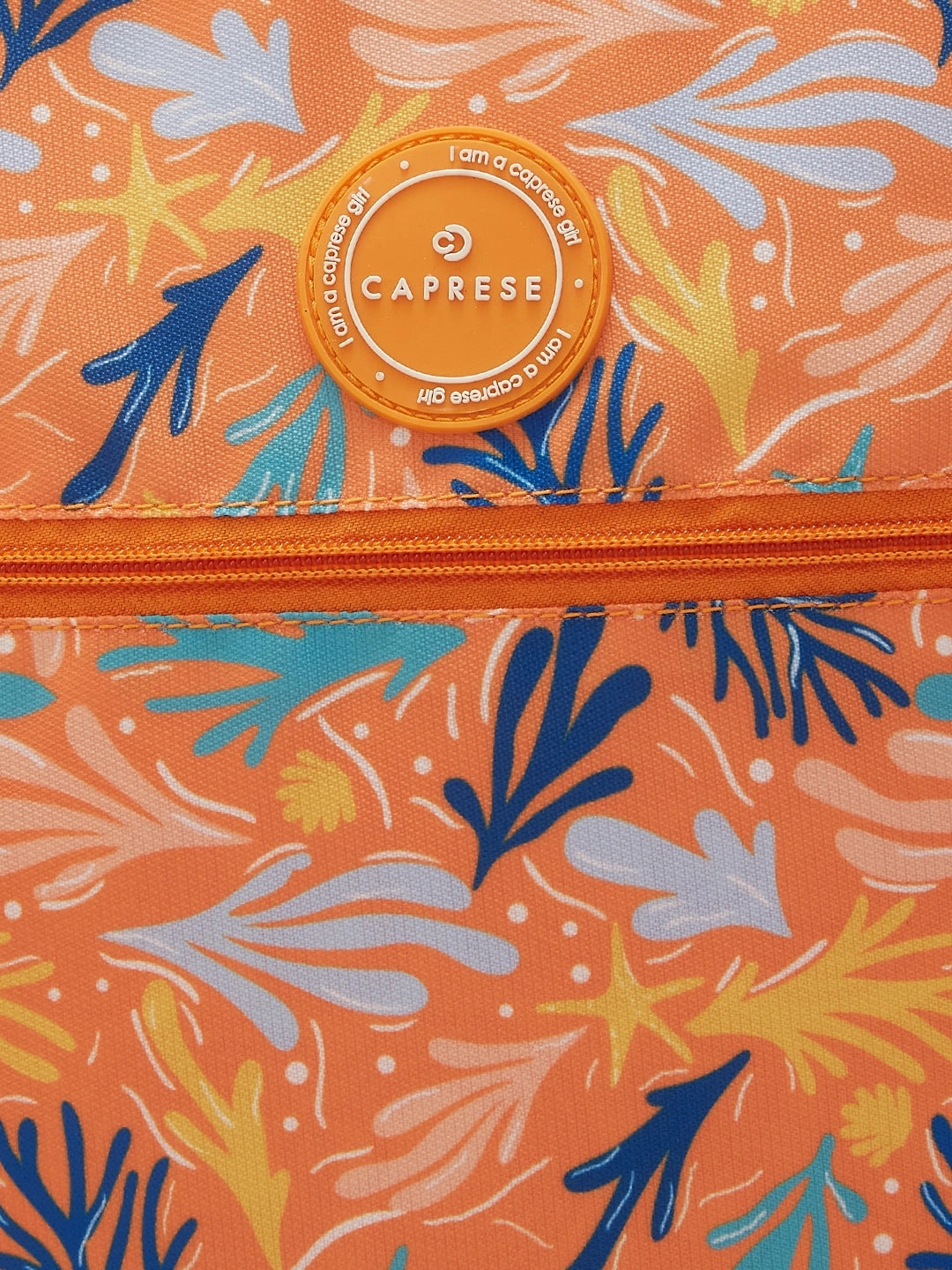 Caprese Xenia Large Printed Orange Laptop Backpack