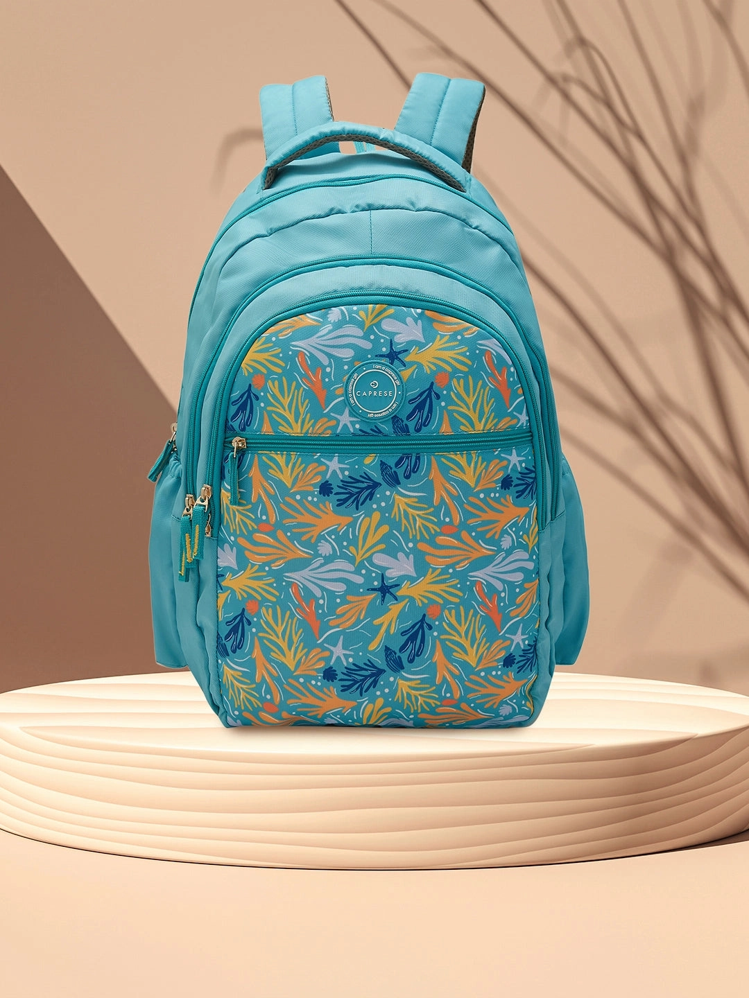 Caprese Xenia Large Printed Turquoise Laptop Backpack