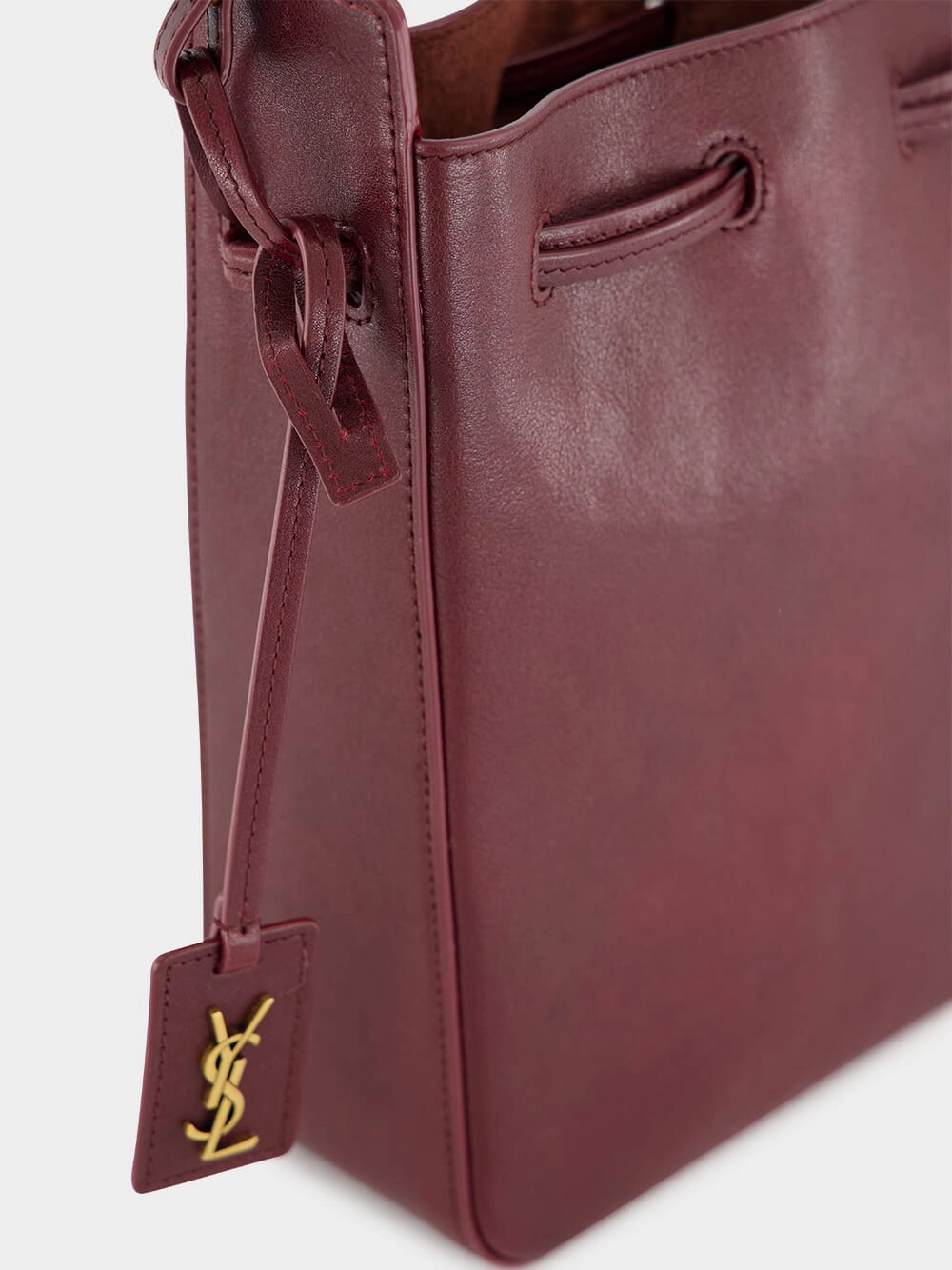 Hot Wine Leather Bucket Bag with Cassandre Charm