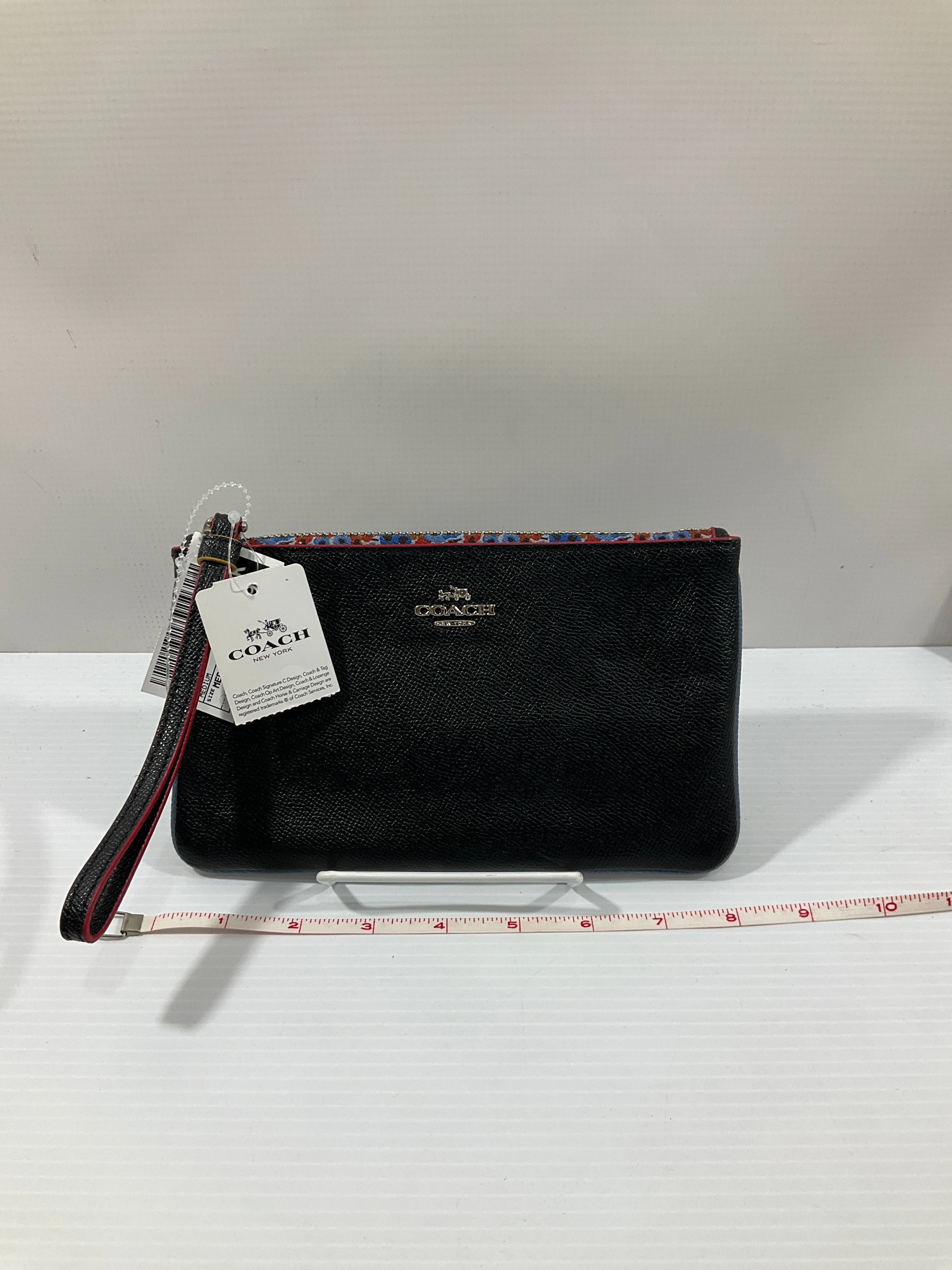 Wristlet Designer By Coach, Size: Medium